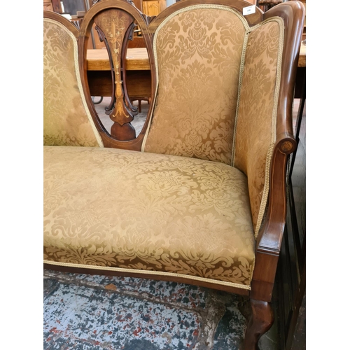 238 - An Edwardian inlaid mahogany framed parlour suite comprising two seat sofa with central oval fretwor... 