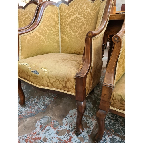 238 - An Edwardian inlaid mahogany framed parlour suite comprising two seat sofa with central oval fretwor... 