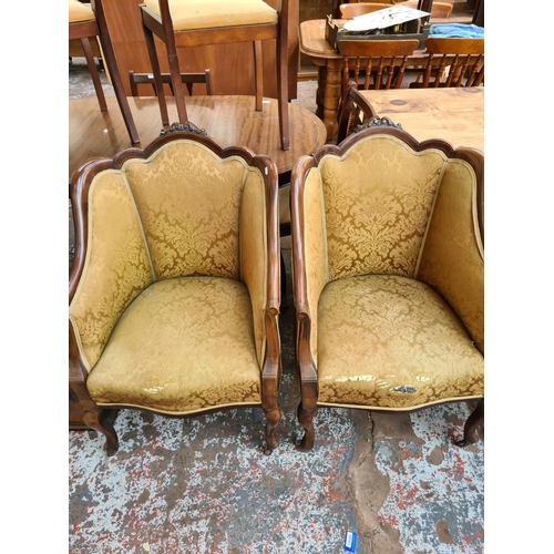 238 - An Edwardian inlaid mahogany framed parlour suite comprising two seat sofa with central oval fretwor... 