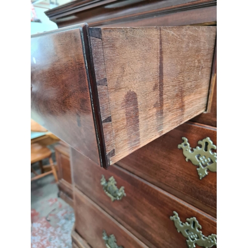 241 - An impressive George III mahogany chest on chest with two short over five long drawers, original bra... 