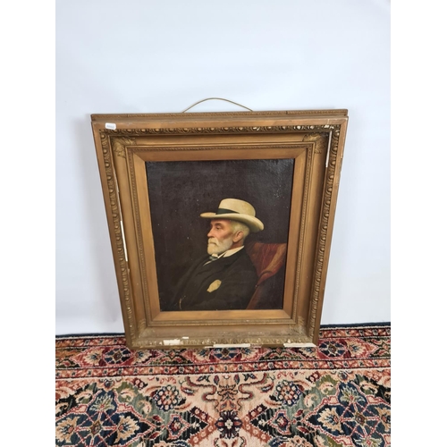 244 - A 19th century gilt framed oil on board portrait of a seated elderly gentleman