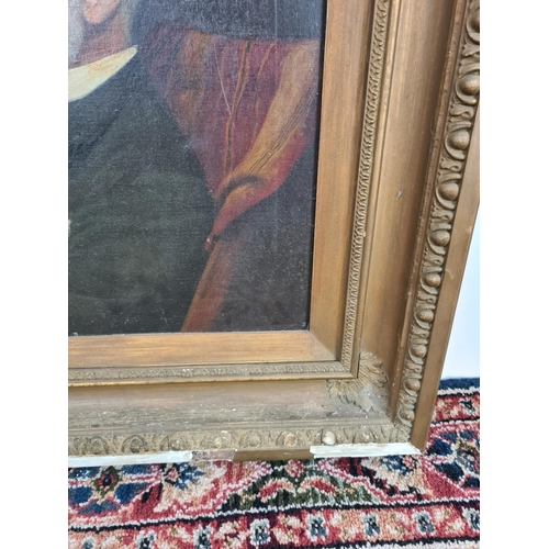 244 - A 19th century gilt framed oil on board portrait of a seated elderly gentleman