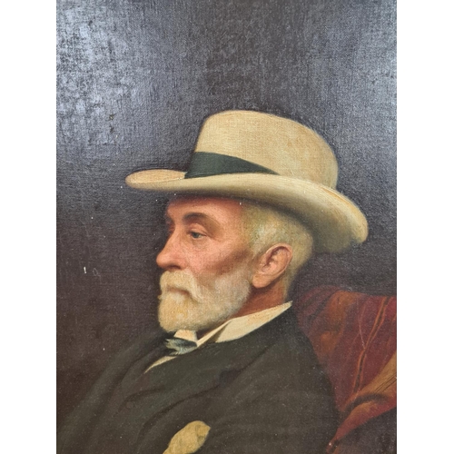 244 - A 19th century gilt framed oil on board portrait of a seated elderly gentleman