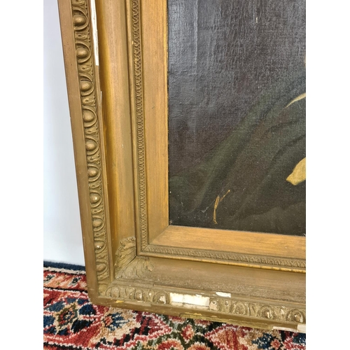 244 - A 19th century gilt framed oil on board portrait of a seated elderly gentleman