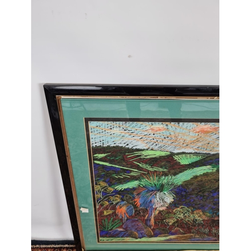 245 - A framed chalk picture of a multicoloured desert landscape in the style of William Crozier