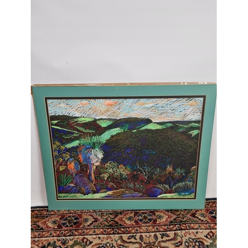 245 - A framed chalk picture of a multicoloured desert landscape in the style of William Crozier