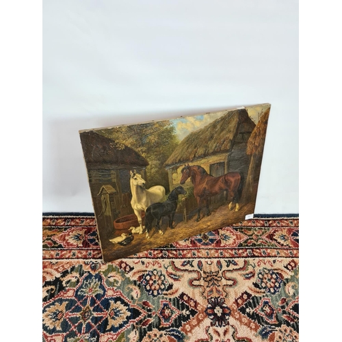 251 - A 19th century unsigned and frameless oil on canvas of horses at stable scene - measuring approx. 61... 