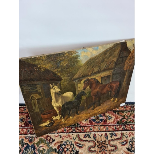 251 - A 19th century unsigned and frameless oil on canvas of horses at stable scene - measuring approx. 61... 