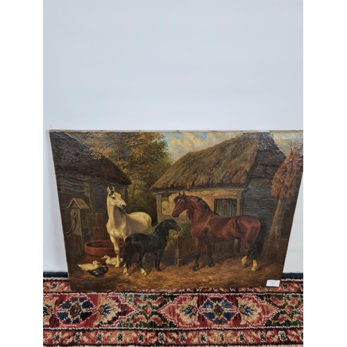 251 - A 19th century unsigned and frameless oil on canvas of horses at stable scene - measuring approx. 61... 