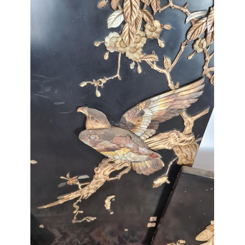 252 - Three 19th century Japan lacquered panels with mother of pearl and ivory artwork depicting birds and... 