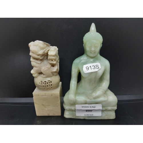 69 - Two oriental ornaments to include a carved jade effect Thai Buddha together with a carved soap stone... 