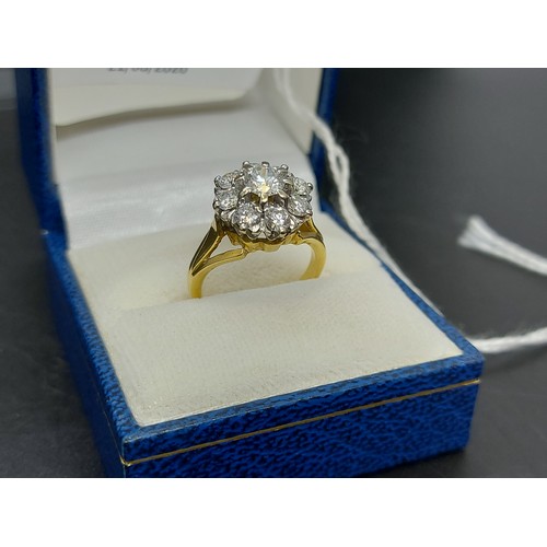 96 - An excellent quality ladies hallmarked 18ct yellow gold, 1.38ct diamond cluster ring with nine inset... 