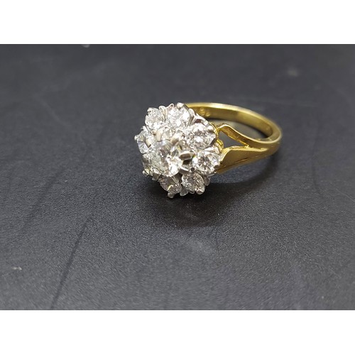 96 - An excellent quality ladies hallmarked 18ct yellow gold, 1.38ct diamond cluster ring with nine inset... 