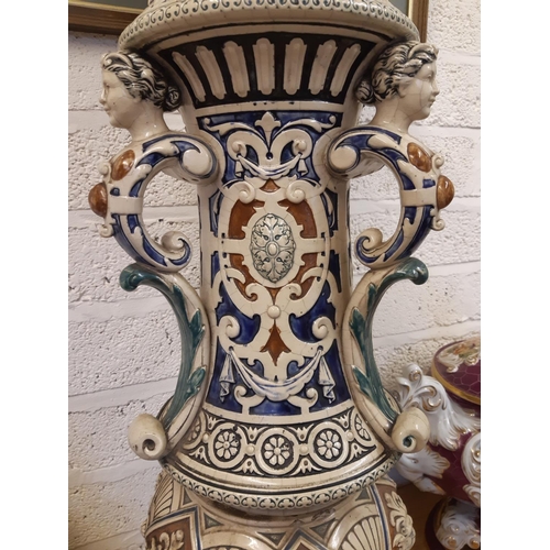 112 - A heavy stoneware salt glazed English Majolica jardinière stand with lion head acanthus leaf and swa... 