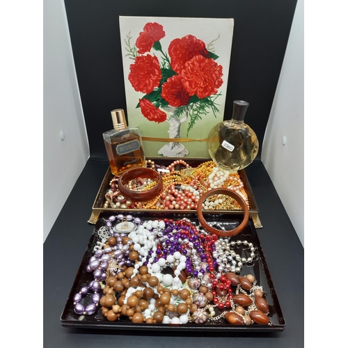 100 - A collection of costume jewellery together with two vintage perfumes to include a gents ‘Aramis’ aft... 