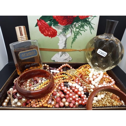 100 - A collection of costume jewellery together with two vintage perfumes to include a gents ‘Aramis’ aft... 