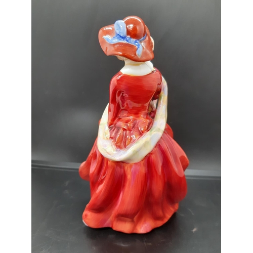 31 - A Royal Doulton 'Top o’ the hill' figurine designed by Lesley Harradine - HN 1834