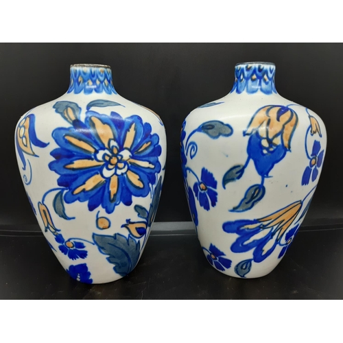 41 - A pair of early 20th century 'Wardle' Vases with tones of blues, greens and yellows signed 'Siam' to... 