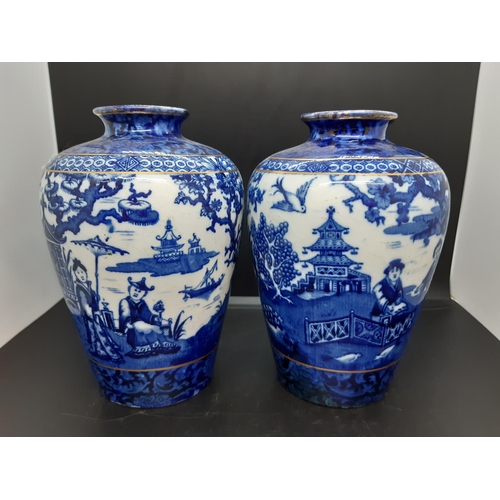 43 - A pair of blue and white 'J Kent Ye Olde Foley Ware' oriental style English porcelain vases with fig... 