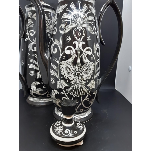 47 - A pair of large modern black and white coffee pots by Sia Home Fashion - measuring approx. 35cm