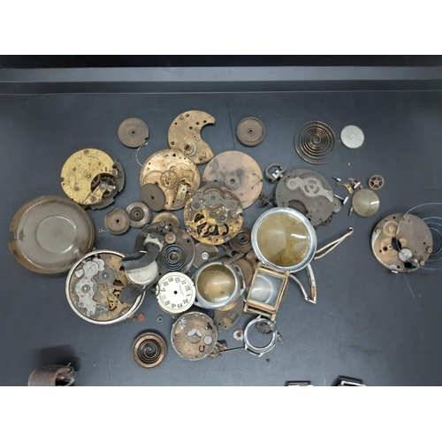 56 - A collection of watch parts and accessories to include 1940’s ‘Misalla’ gents wrist watch with brown... 