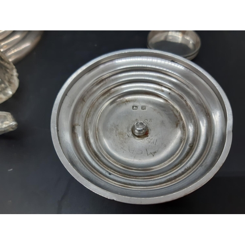 60 - A collection of various hallmarked silver to include a four stepped base (total approx. weight 125 g... 