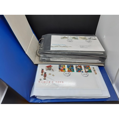 80 - Two folders containing a large quantity of first day covers to include ‘The Royal Wedding’, ‘Europa ... 