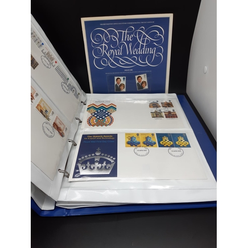 80 - Two folders containing a large quantity of first day covers to include ‘The Royal Wedding’, ‘Europa ... 