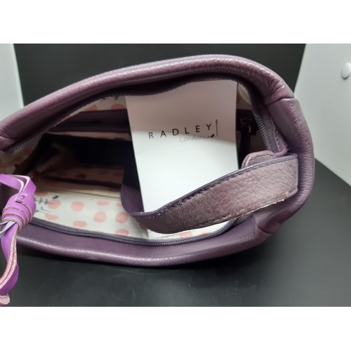 86 - A ladies ‘Radley London’ purple leather shoulder / hand bag