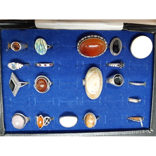 89 - A ring box containing a collection of mostly hallmarked silver ladies dress rings to include an oval... 