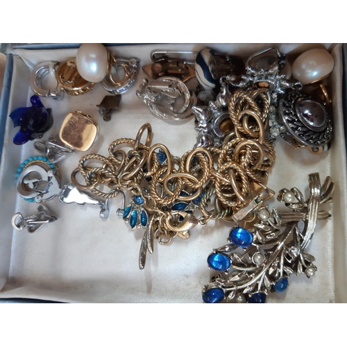 92 - A box containing a large collection of costume jewellery and watches to include an Art Deco hallmark... 