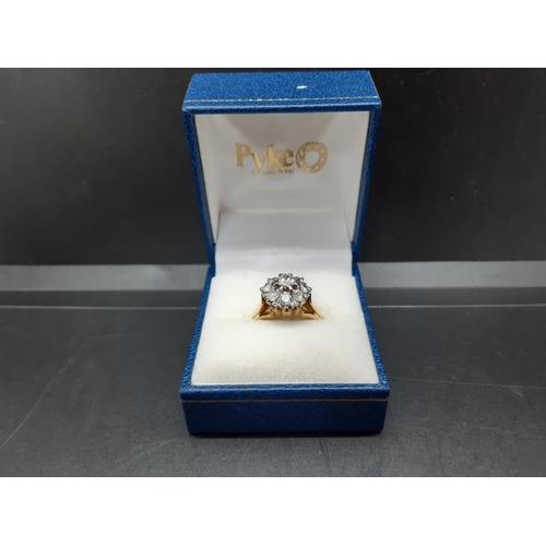 96 - An excellent quality ladies hallmarked 18ct yellow gold, 1.38ct diamond cluster ring with nine inset... 