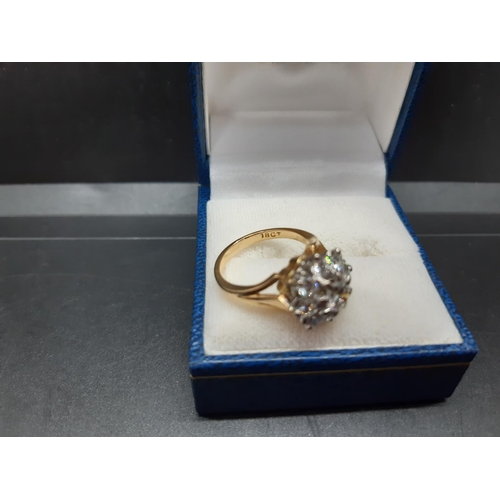 96 - An excellent quality ladies hallmarked 18ct yellow gold, 1.38ct diamond cluster ring with nine inset... 