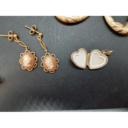 117 - A collection of hallmarked 9ct gold jewellery comprising a large pair of earrings with etched design... 