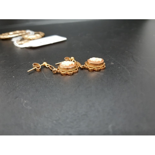 117 - A collection of hallmarked 9ct gold jewellery comprising a large pair of earrings with etched design... 