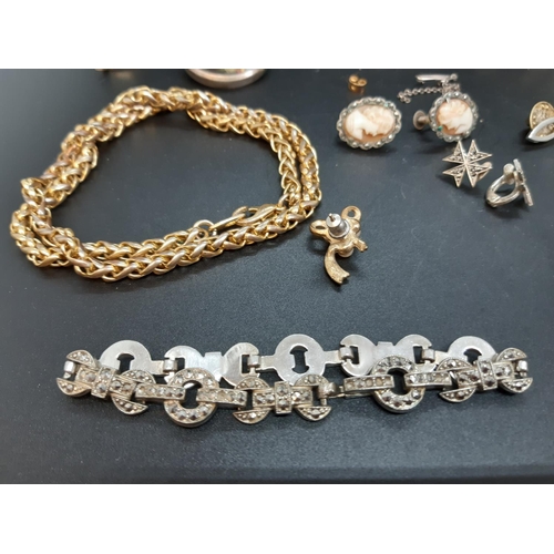 119 - A Collection of vintage and antique jewellery comprising simulated pearl necklace, bearded gentleman... 
