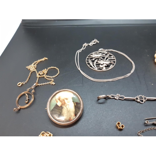 119 - A Collection of vintage and antique jewellery comprising simulated pearl necklace, bearded gentleman... 