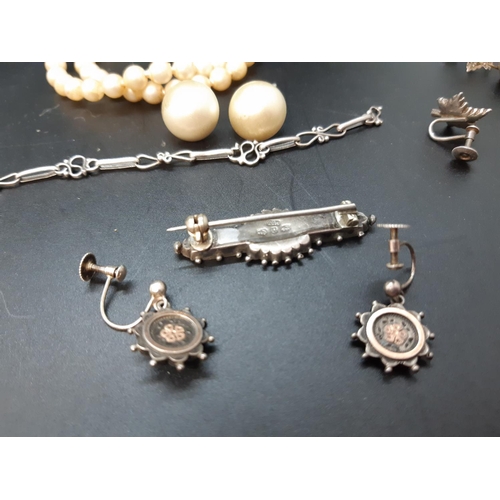 119 - A Collection of vintage and antique jewellery comprising simulated pearl necklace, bearded gentleman... 