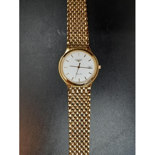 123 - A gents Longines Quartz Flagship 7292 wristwatch with white dial, gold tone hourly batons, the date ... 