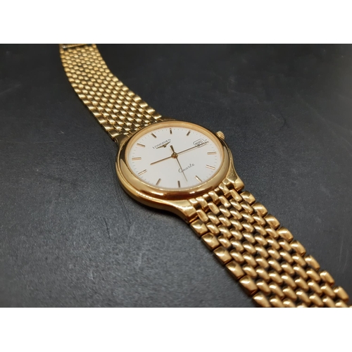 123 - A gents Longines Quartz Flagship 7292 wristwatch with white dial, gold tone hourly batons, the date ... 