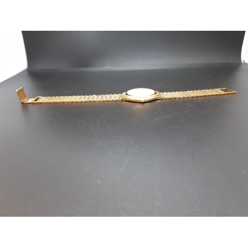 123 - A gents Longines Quartz Flagship 7292 wristwatch with white dial, gold tone hourly batons, the date ... 