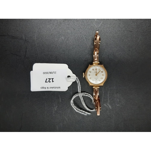 127 - A vintage ladies hallmarked 9ct gold manual wind Swiss, Cyma Cymaflex ladies wrist watch with white ... 