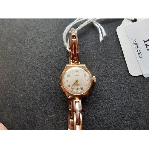 127 - A vintage ladies hallmarked 9ct gold manual wind Swiss, Cyma Cymaflex ladies wrist watch with white ... 