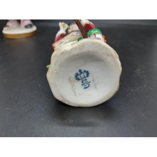 17 - A group of four continental porcelain figurines to include Sandizell Hoffner & Co 1950's Rococo styl... 