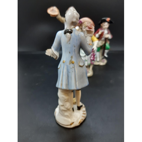 17 - A group of four continental porcelain figurines to include Sandizell Hoffner & Co 1950's Rococo styl... 