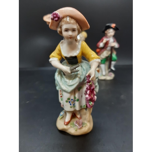 17 - A group of four continental porcelain figurines to include Sandizell Hoffner & Co 1950's Rococo styl... 