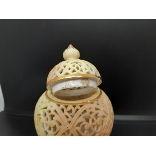 2 - A 19th century Royal China Works Grainger & Co. blush ivory pot pourri on tri footed base