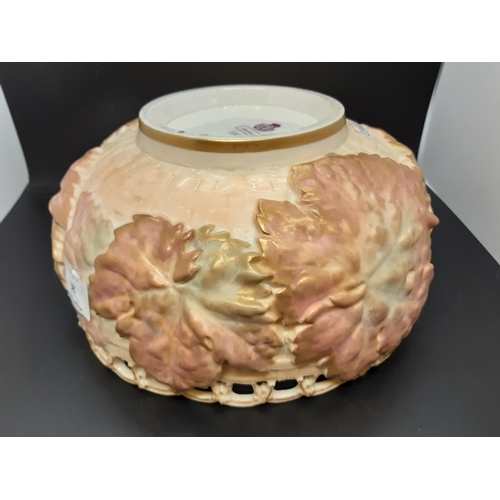 26 - A large Royal Worcester centre bowl decorated with basket weave design, large open pierced scalloped... 