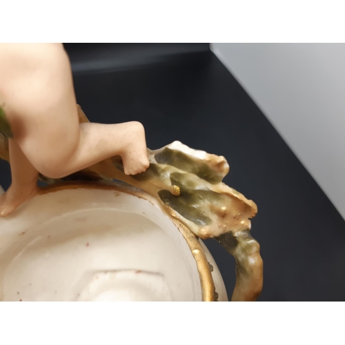 28 - An Art Nouveau Ernst Wahliss Wien Teplitz pot pourri pot with putti and leaf design