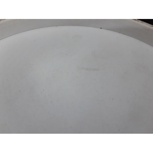 31 - A Wedgwood Jasperware cobalt blue cheese dome with putti and acanthus relief design and impressed 